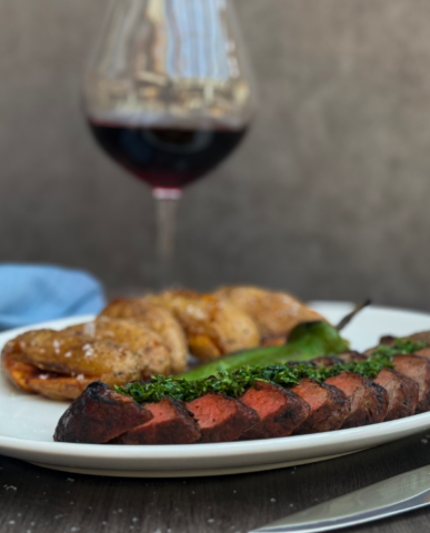 A Steak Dish with Ancho-Pasilla Rub, Anaheim Pepper, Crushed Fingerling Potato, and Chimichurri
